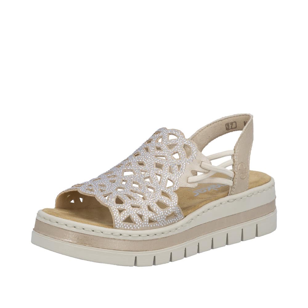 Rieker sandal til dame i beige med glimmeroverdel samt en plateauhæl på 5 cm og elastik